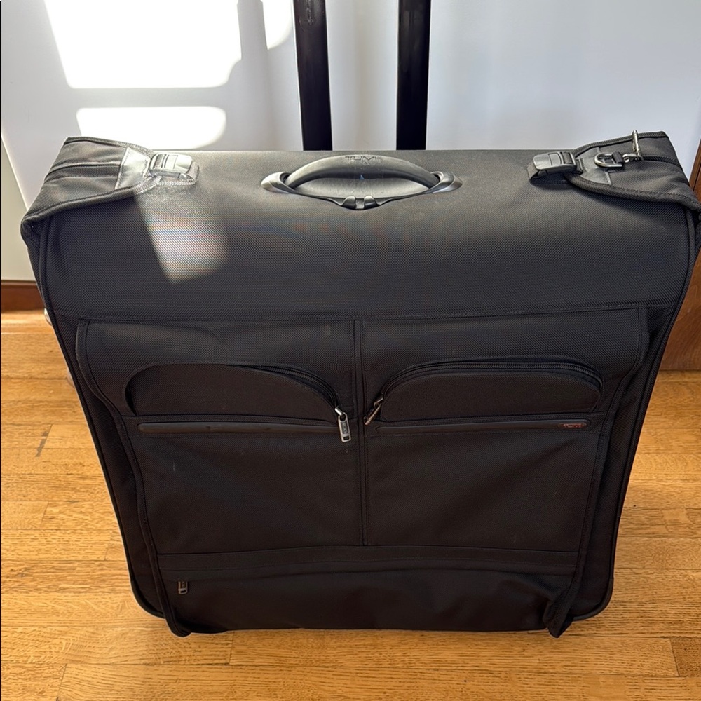 Black Tumi Travel Suit Luggage